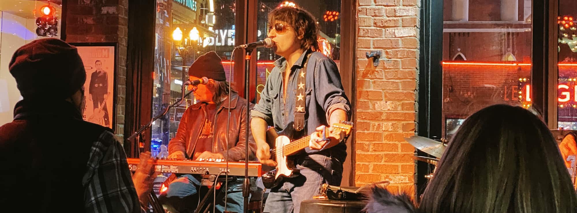 bar singer on guitar in Corpus Christi