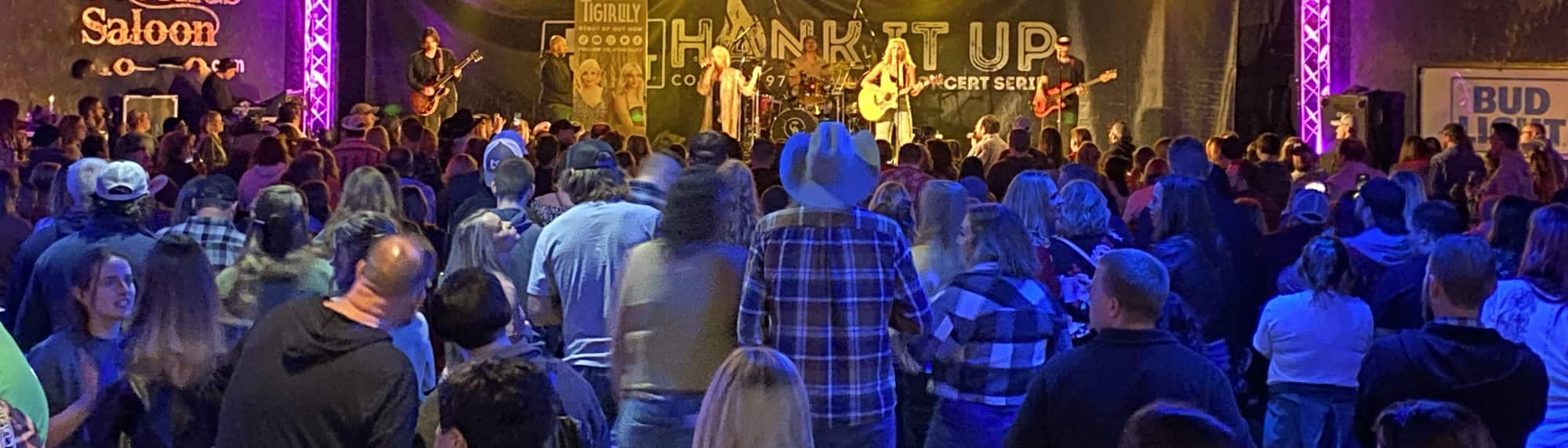 country concert with fans wearing cowboy hats Corpus Christi