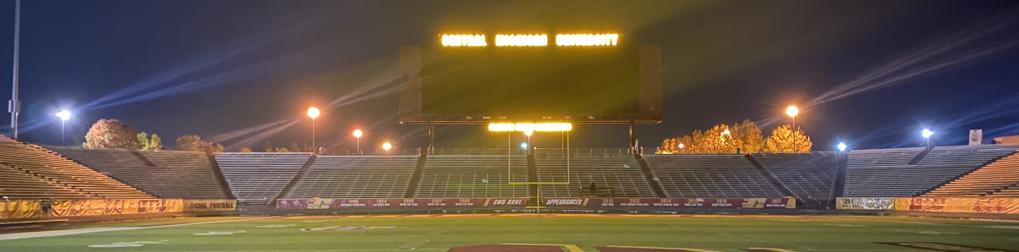 empty football stadium at night under the lights Corpus Christi
